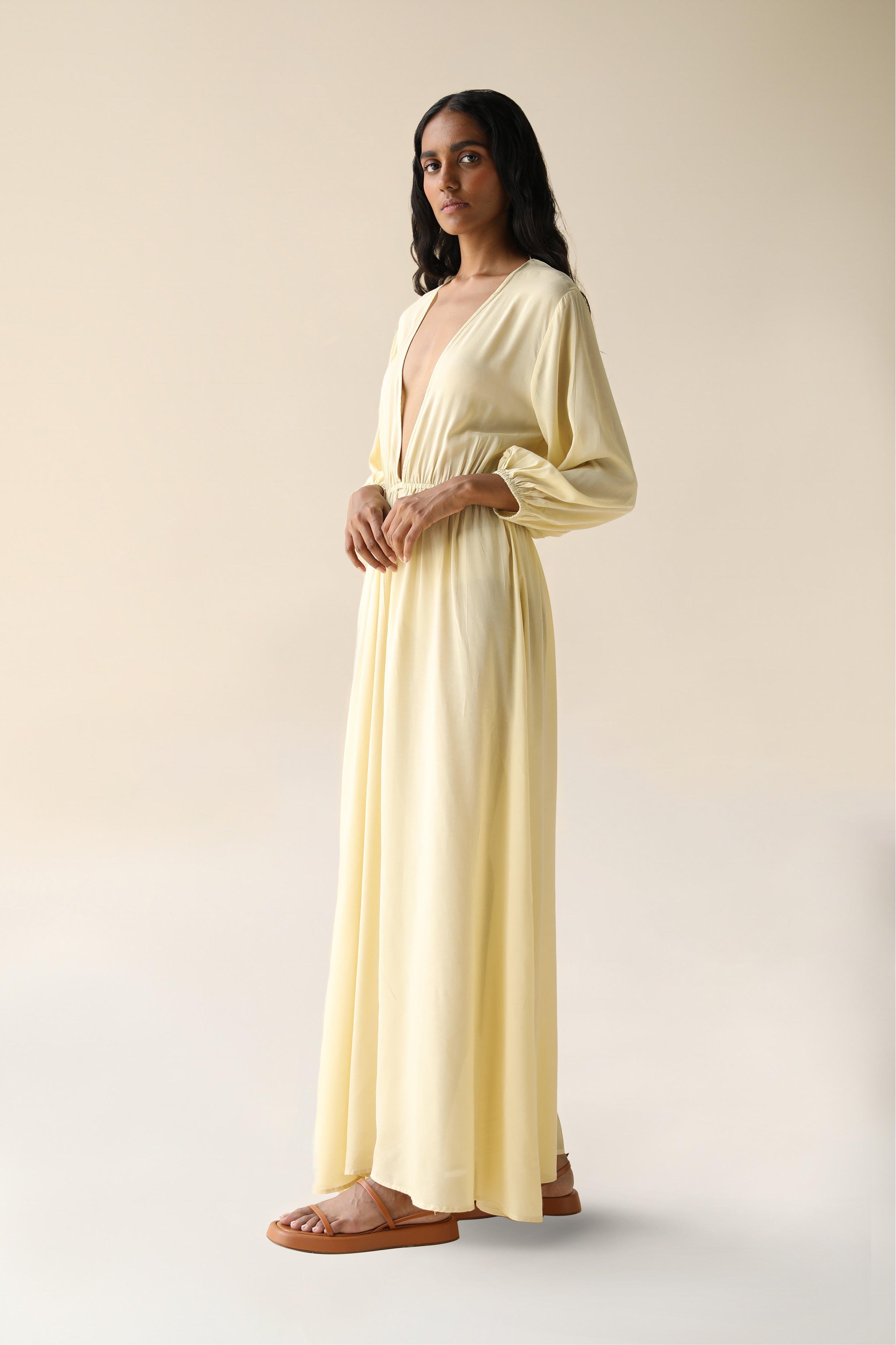 Connie Maxi Dress Hemp Modal Sand | Elegant Low V Long Sleeved Maxi Dress in Cream | FARA Boutique - FARABOUTIQUE Connie Maxi Dress Hemp Modal Sand | Elegant Low V Long Sleeved Maxi Dress in Cream | FARA Boutique - FARABOUTIQUE