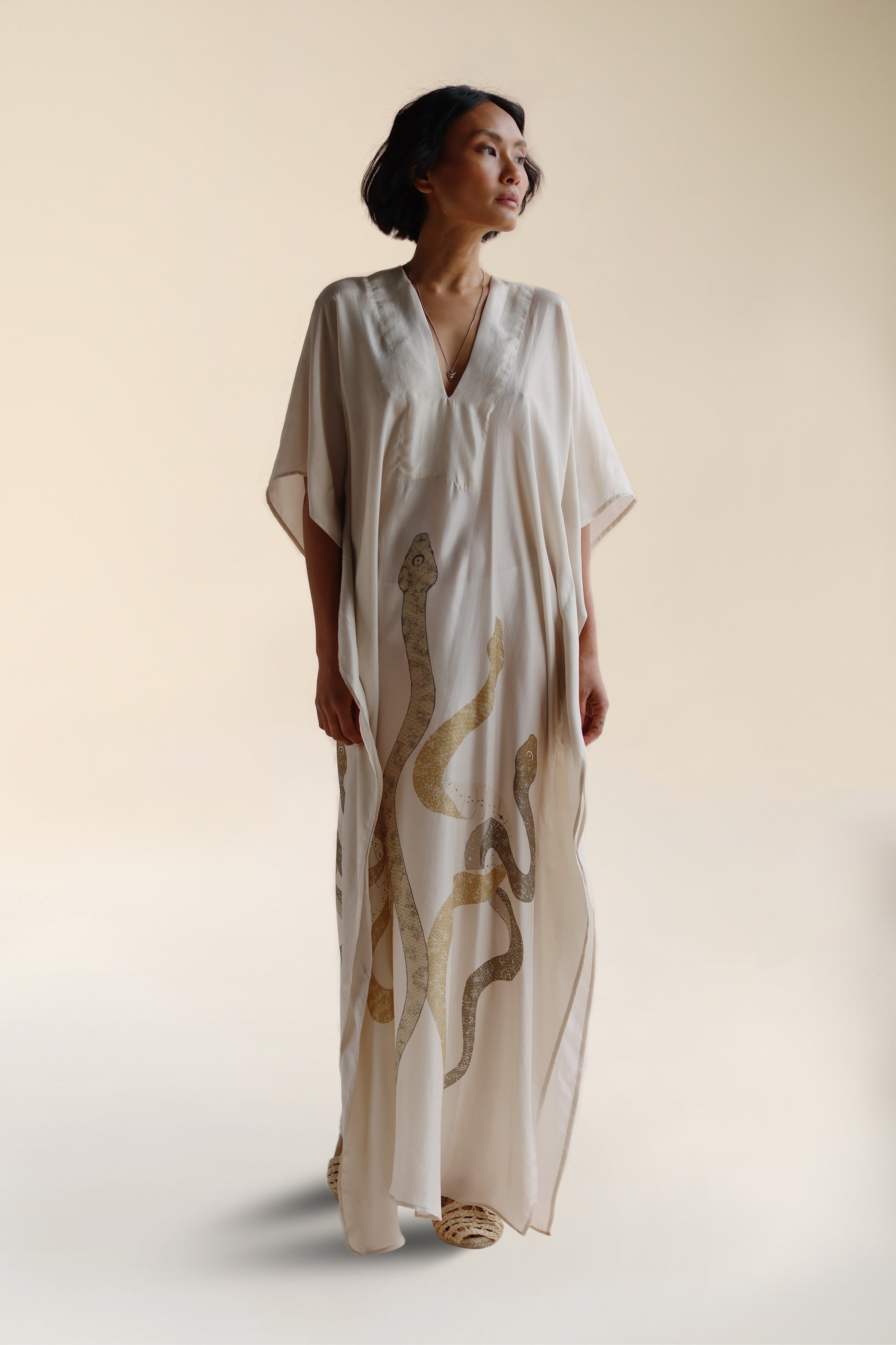 Rise Kaftan Silk Cream | Hand Drawn and Printed Mystical Serpent Print Cream Silk Kaftan | FARA Boutique Rise Kaftan Silk Cream | Hand Drawn and Printed Mystical Serpent Print Cream Silk Kaftan | FARA Boutique
